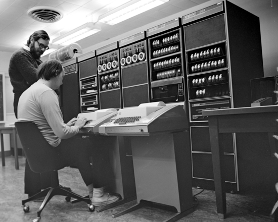 Image credit: https://upload.wikimedia.org/wikipedia/commons/8/8f/Ken_Thompson_%28sitting%29_and_Dennis_Ritchie_at_PDP-11_%282876612463%29.jpg